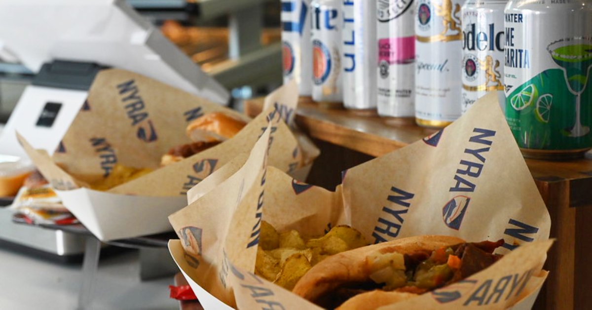 take n go sandwiches near cans of craft beverages