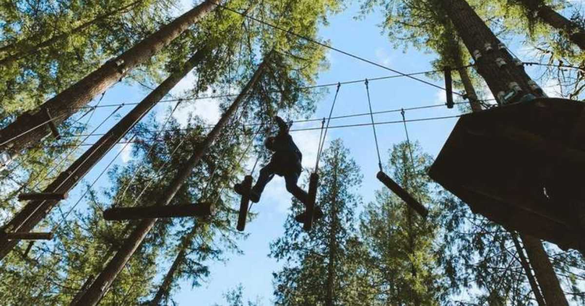 person on ropes course