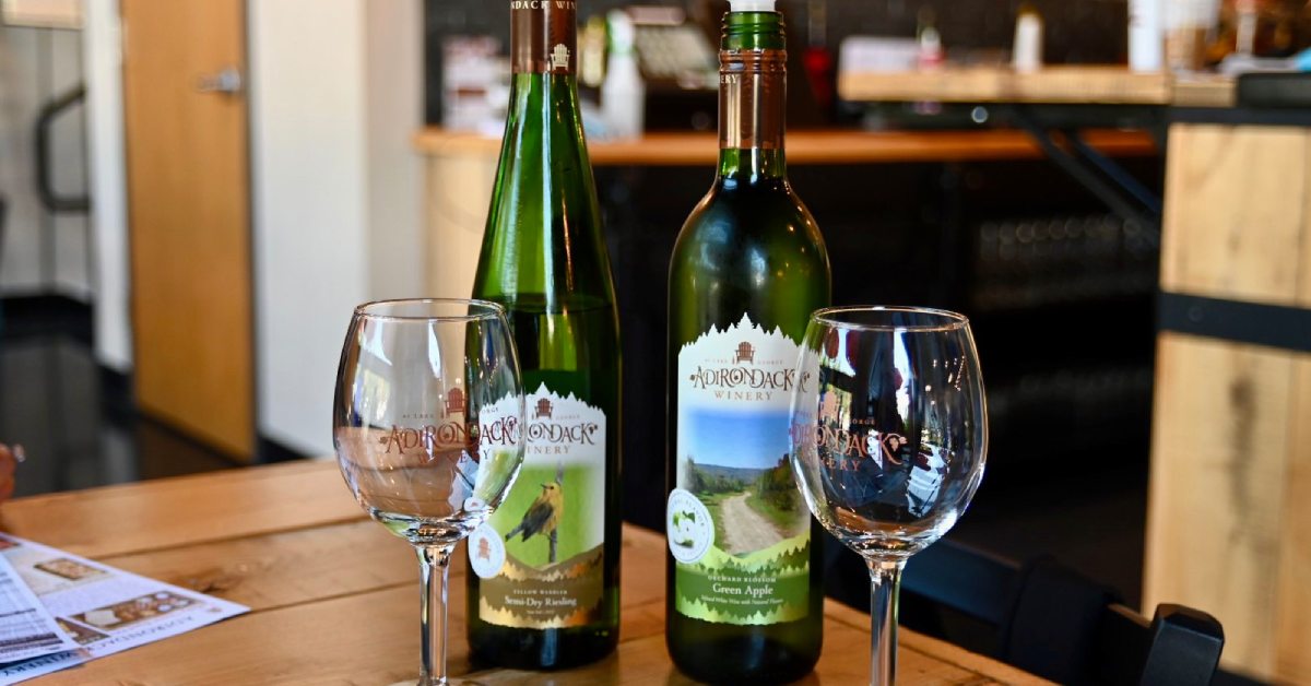 two wine glasses and two bottles