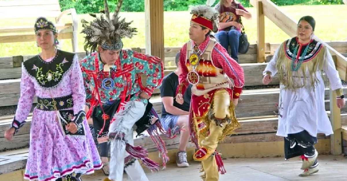 people dancing in Iroquois inspired clothing