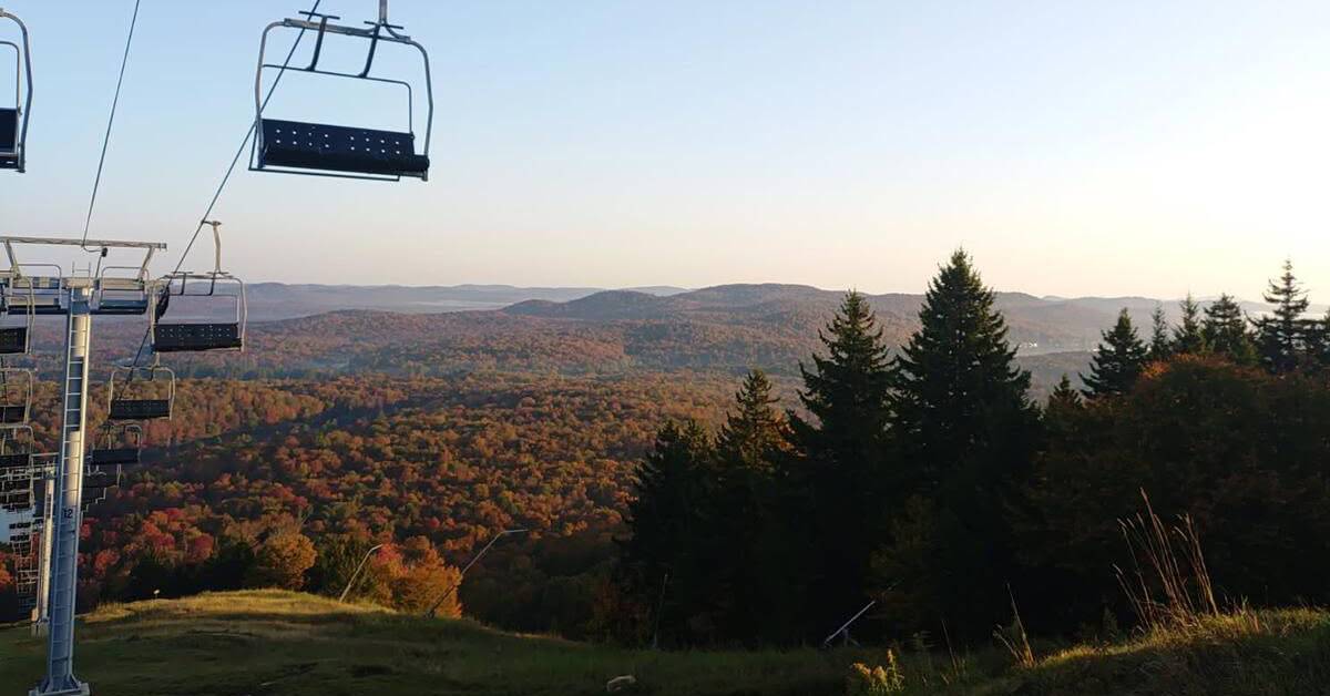 chairlift over fall foliage