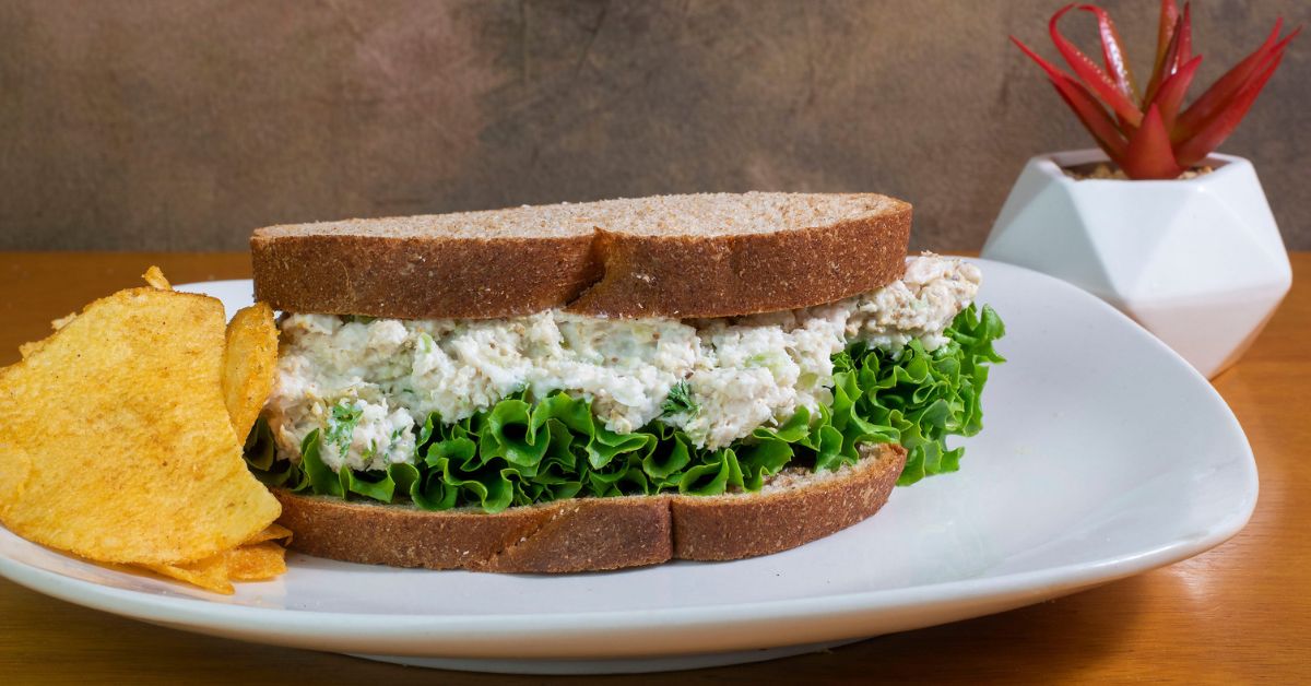 Chicken salad sandwich with chips