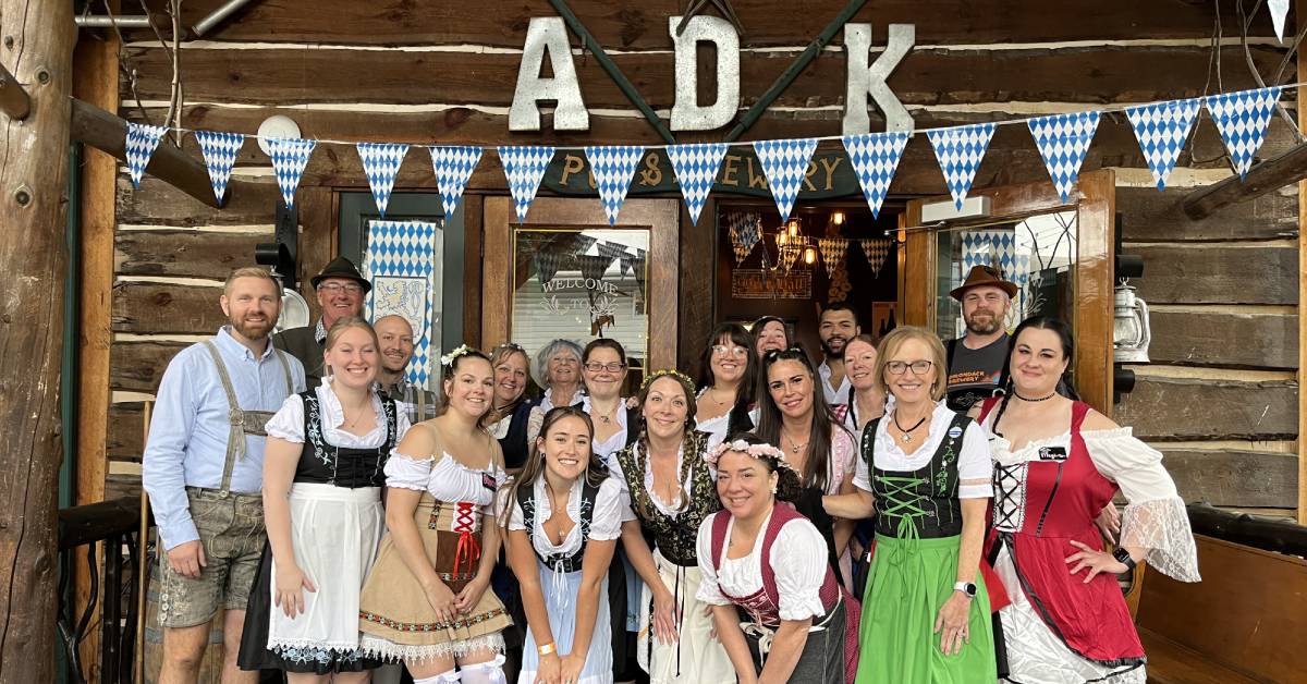 adirondack brewery people posing in german attire