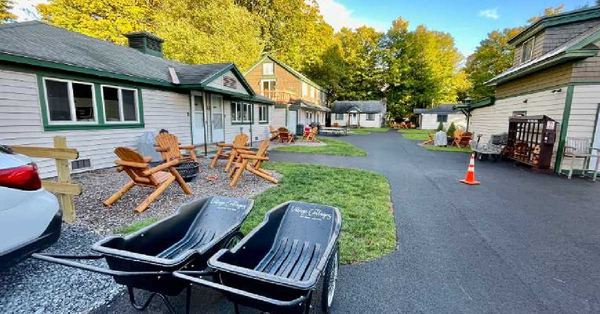 a cottage property with fire pits outside them