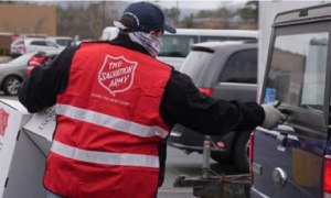 man wearing a salvation army vest