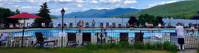 people at pool by lake