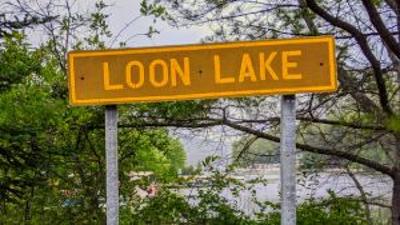 sign that says loon lake