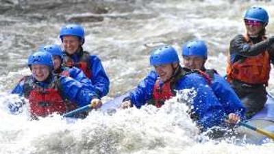 group of six whitewater rafting