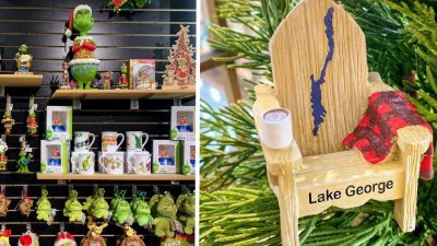 grinch christmas items and decor and a lake george adirondack chair ornament on display