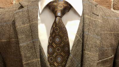 closeup of brown and gold patterned tie