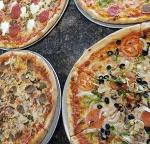 pizzas on display