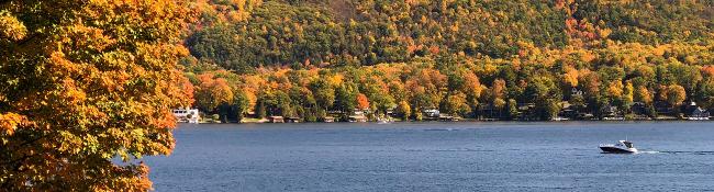 boat on lake george in fall