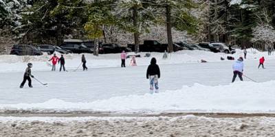 people ice skating on crandall pond