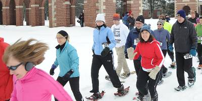 people snowshoeing at saratoga spa state park