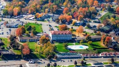 aerial view of fort william henry and lake george in fall