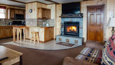 cottage with fire in fireplace