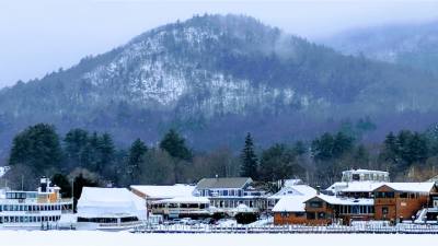 winter scene in lake george with mountain