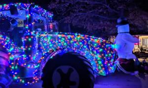 lighted holiday tractor in parade