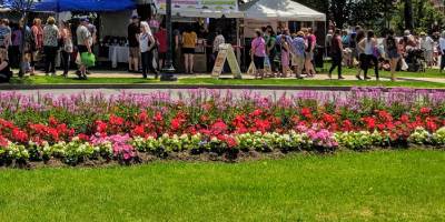 springtime in glens falls at event with vendors and crowd