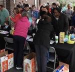 people at charity booth