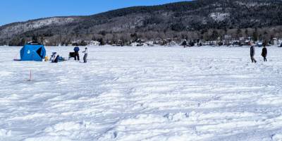 ice fishers and people on lake george