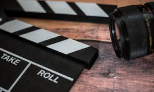 closeup of camera and clapperboard 
