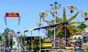 roller coaster and paratrooper ride at hoffman's playland