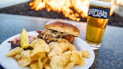 burger with chips and beer