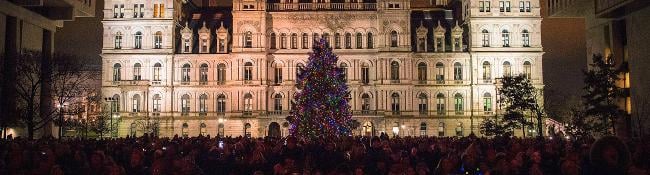 christmas tree lit up in front of albany capitol