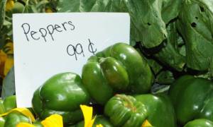 green bell peppers for sale at farmers market