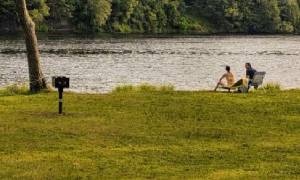 people by the water and a grill at haviland cove