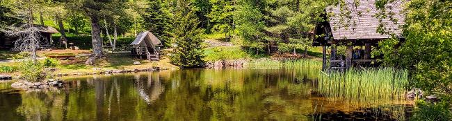 adirondack experience at blue mountain lake pond and structures