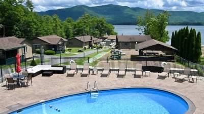 pool and cabins by lake george