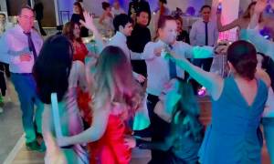 people dancing at a wedding