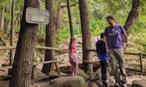 dad and kids at natural stone bridge and caves 