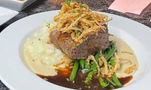 steak and potatoes dish