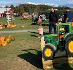 parents and kids at fall farm